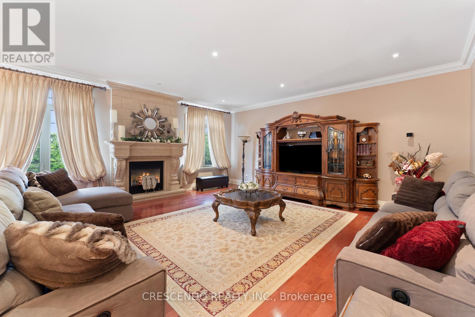 2 Prince Adam Court, King, ON - Indoor Photo Showing Living Room With Fireplace
