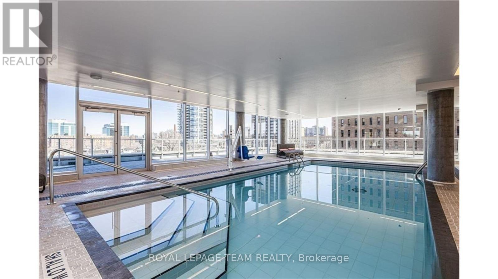 2302 - 805 Carling Avenue, Ottawa, ON - Indoor Photo Showing Other Room With In Ground Pool