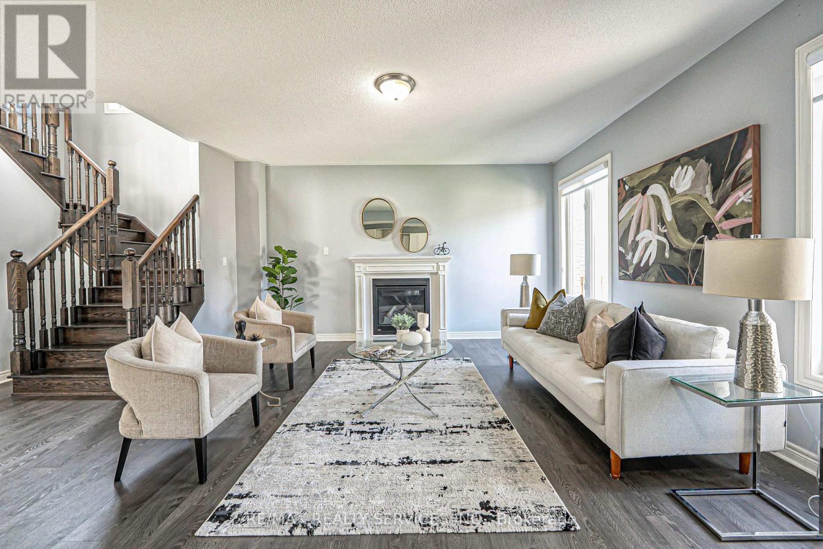 10 Mccabe Lane, New Tecumseth, ON - Indoor Photo Showing Living Room With Fireplace