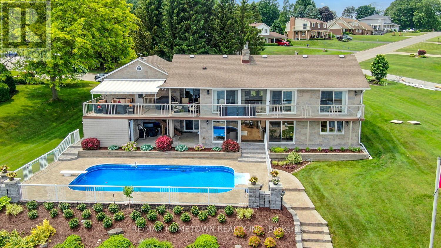 1111 Burnside Drive, Augusta, ON - Outdoor With In Ground Pool With Deck Patio Veranda