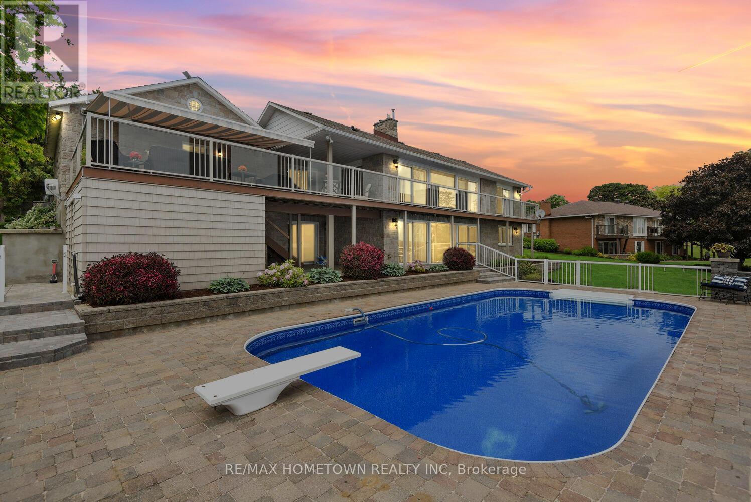 1111 Burnside Drive, Augusta, ON - Outdoor With In Ground Pool