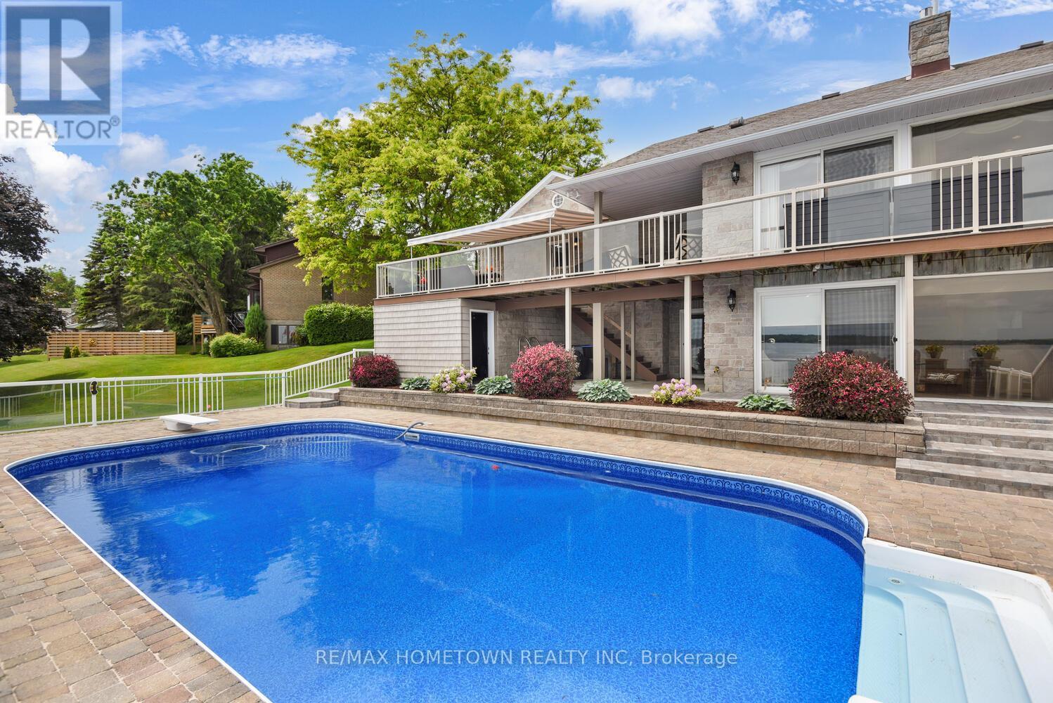 1111 Burnside Drive, Augusta, ON - Outdoor With In Ground Pool With Deck Patio Veranda