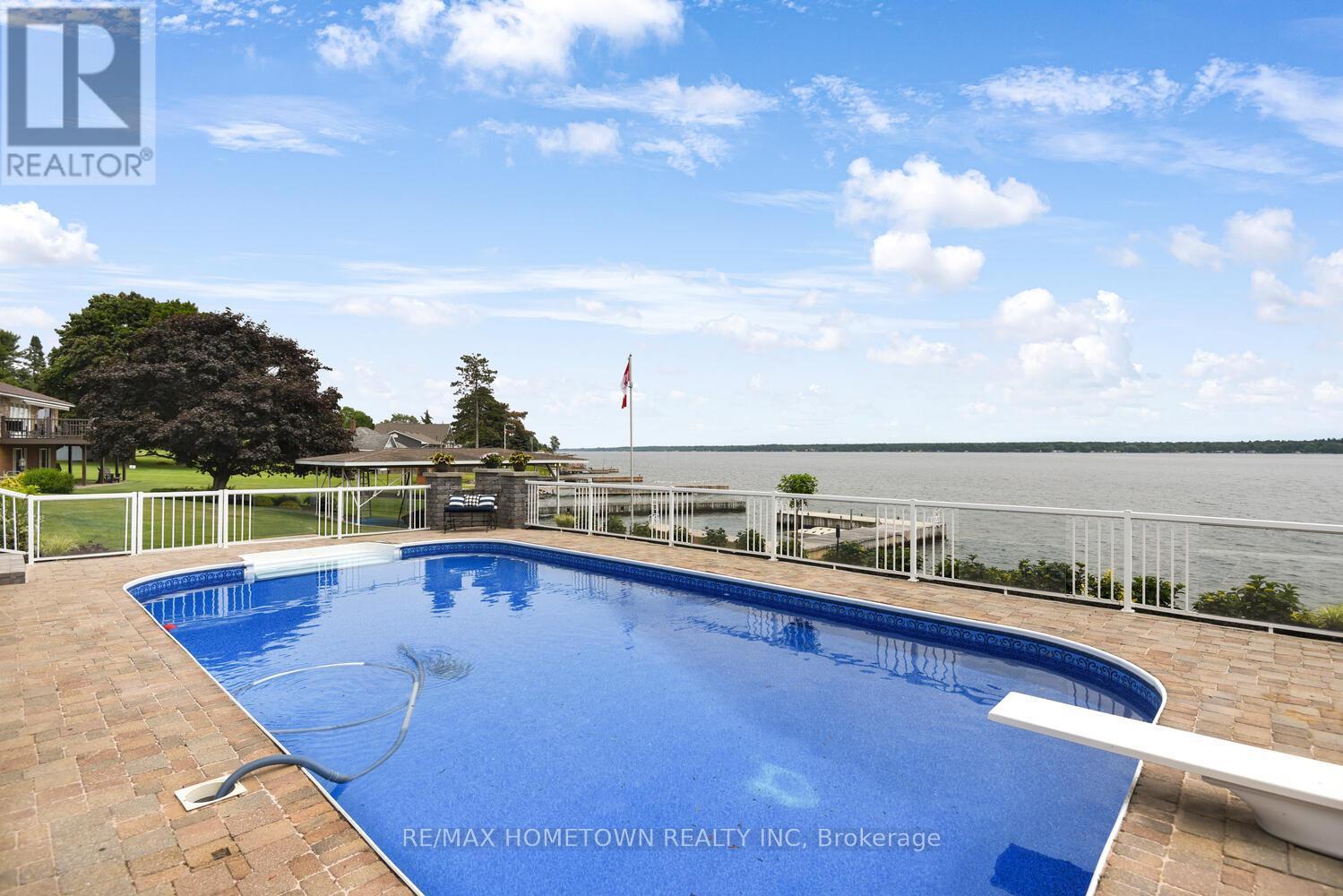 1111 Burnside Drive, Augusta, ON - Outdoor With In Ground Pool