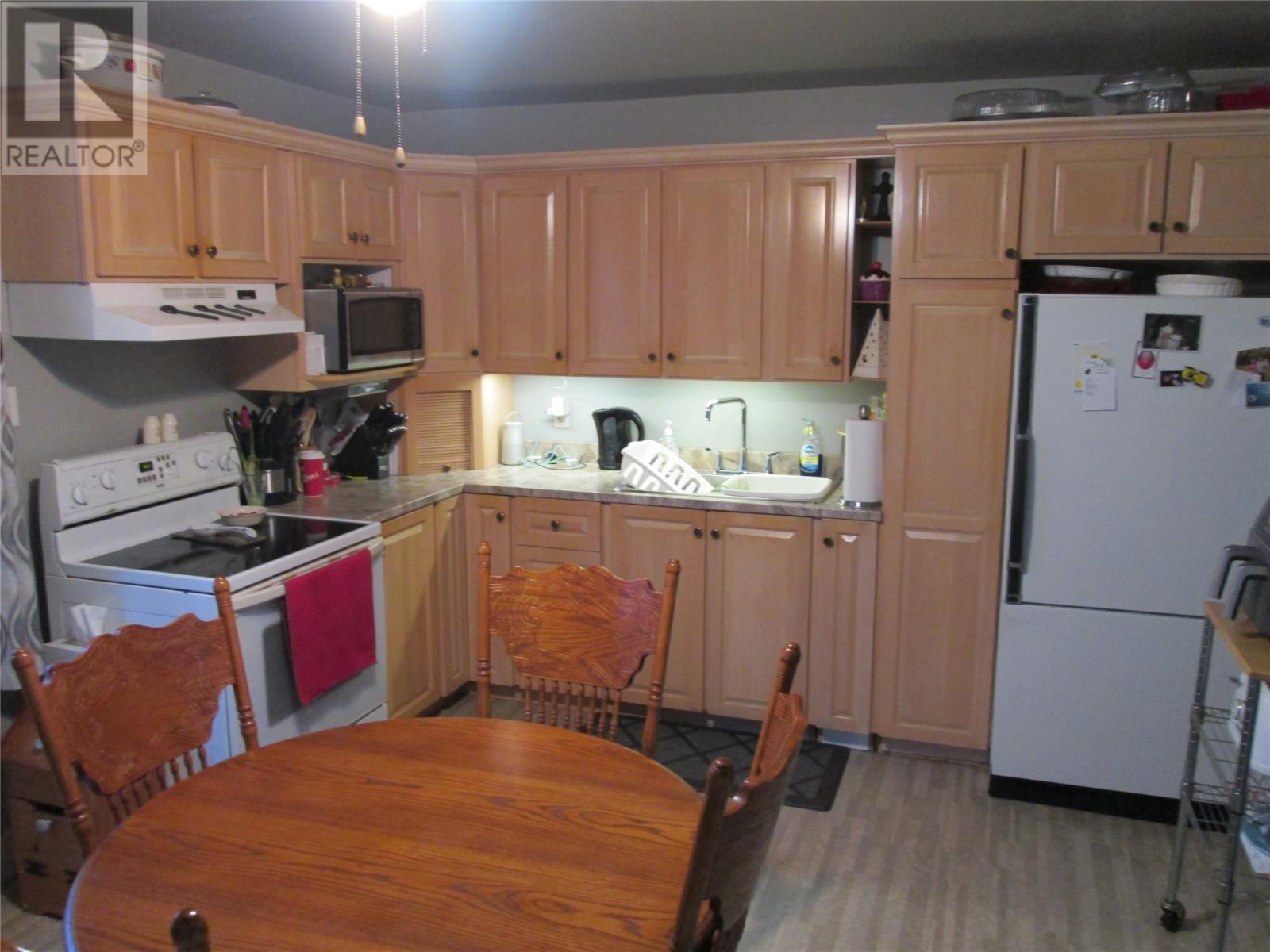 7-9 Forest Road, Bishop'S Falls, NL - Indoor Photo Showing Kitchen