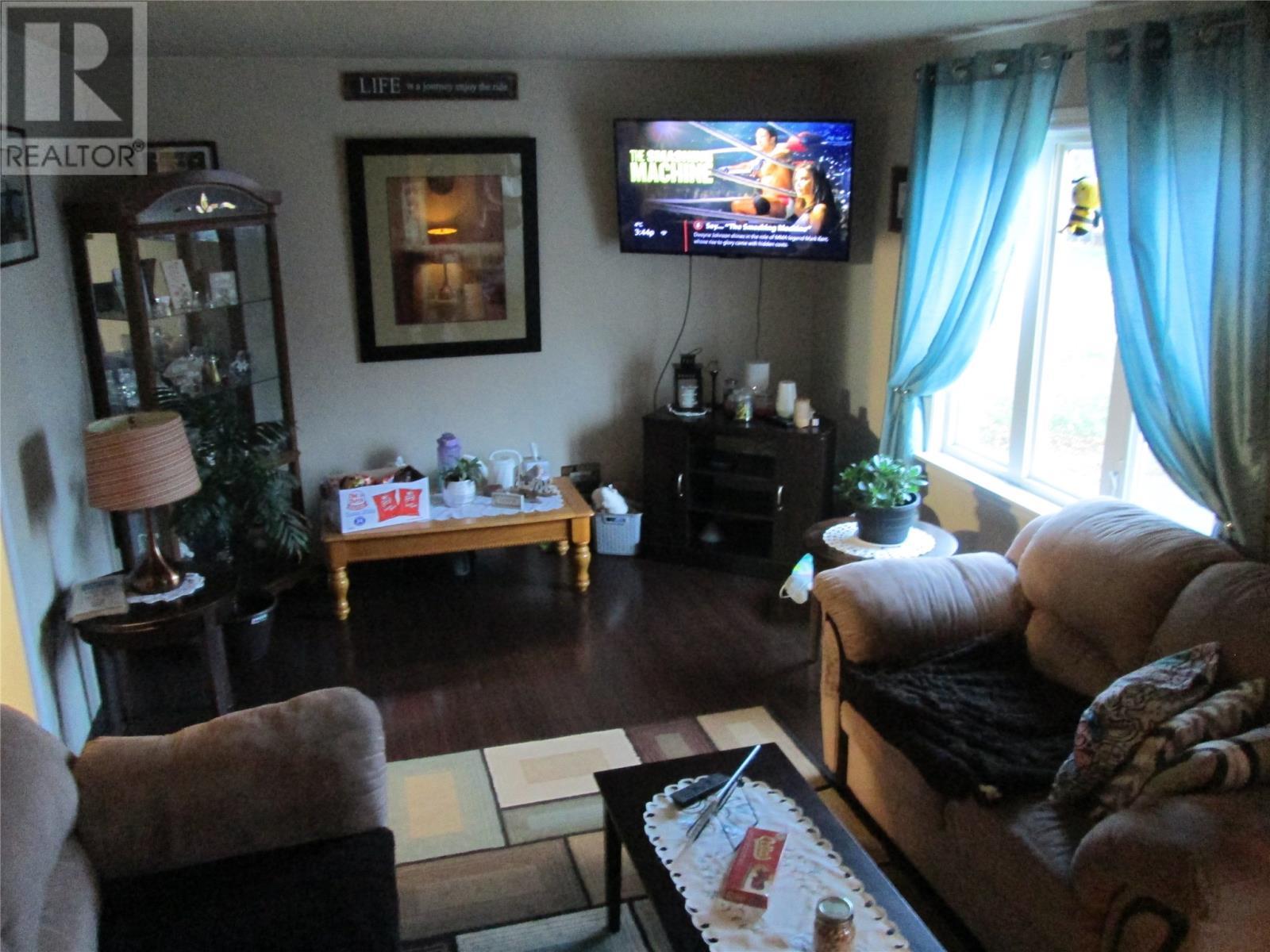 7-9 Forest Road, Bishop'S Falls, NL - Indoor Photo Showing Living Room