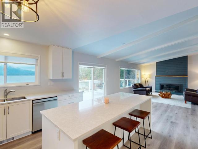 2440 Jenkinson Road, Powell River, BC - Indoor Photo Showing Kitchen With Fireplace