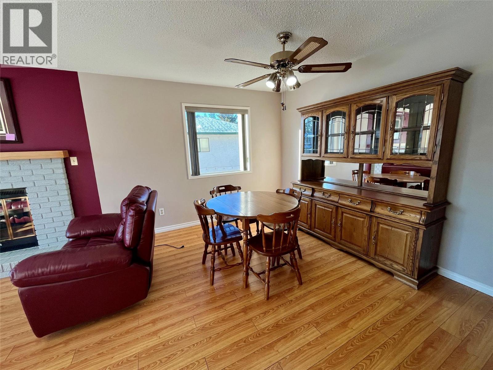 215 Peace River Crescent, Tumbler Ridge, BC - Indoor Photo Showing Other Room With Fireplace