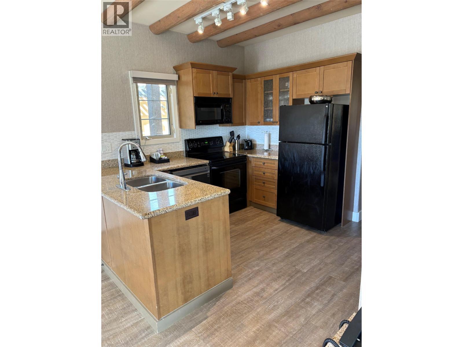 1200 Rancher Creek Road Unit# 10, Osoyoos, BC - Indoor Photo Showing Kitchen With Double Sink