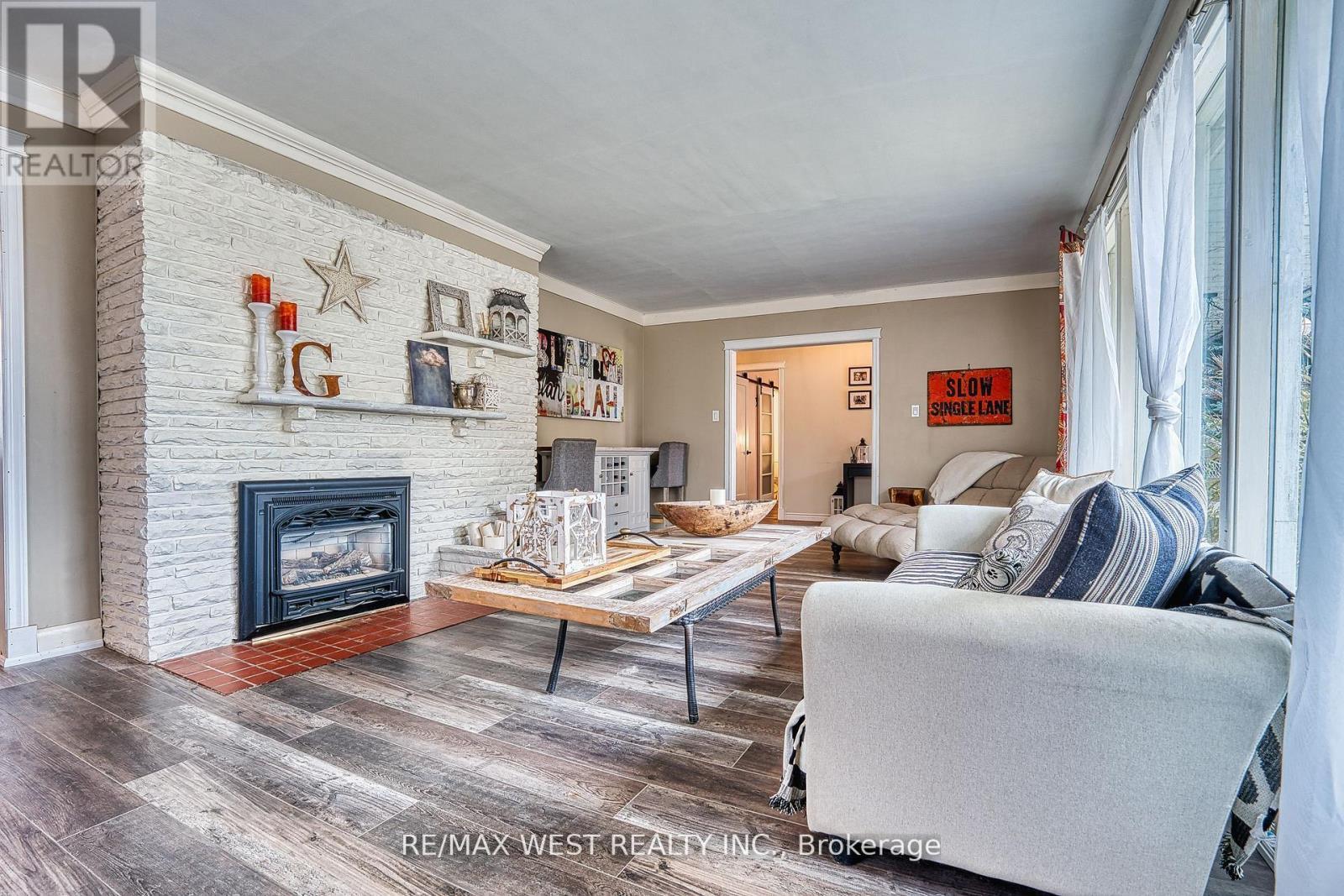 16 First Street W, Woolwich, ON - Indoor Photo Showing Living Room With Fireplace