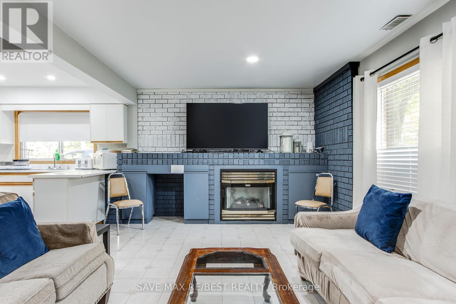 #A - 910 Concession Rd 17 W, Tiny, ON - Indoor Photo Showing Living Room With Fireplace