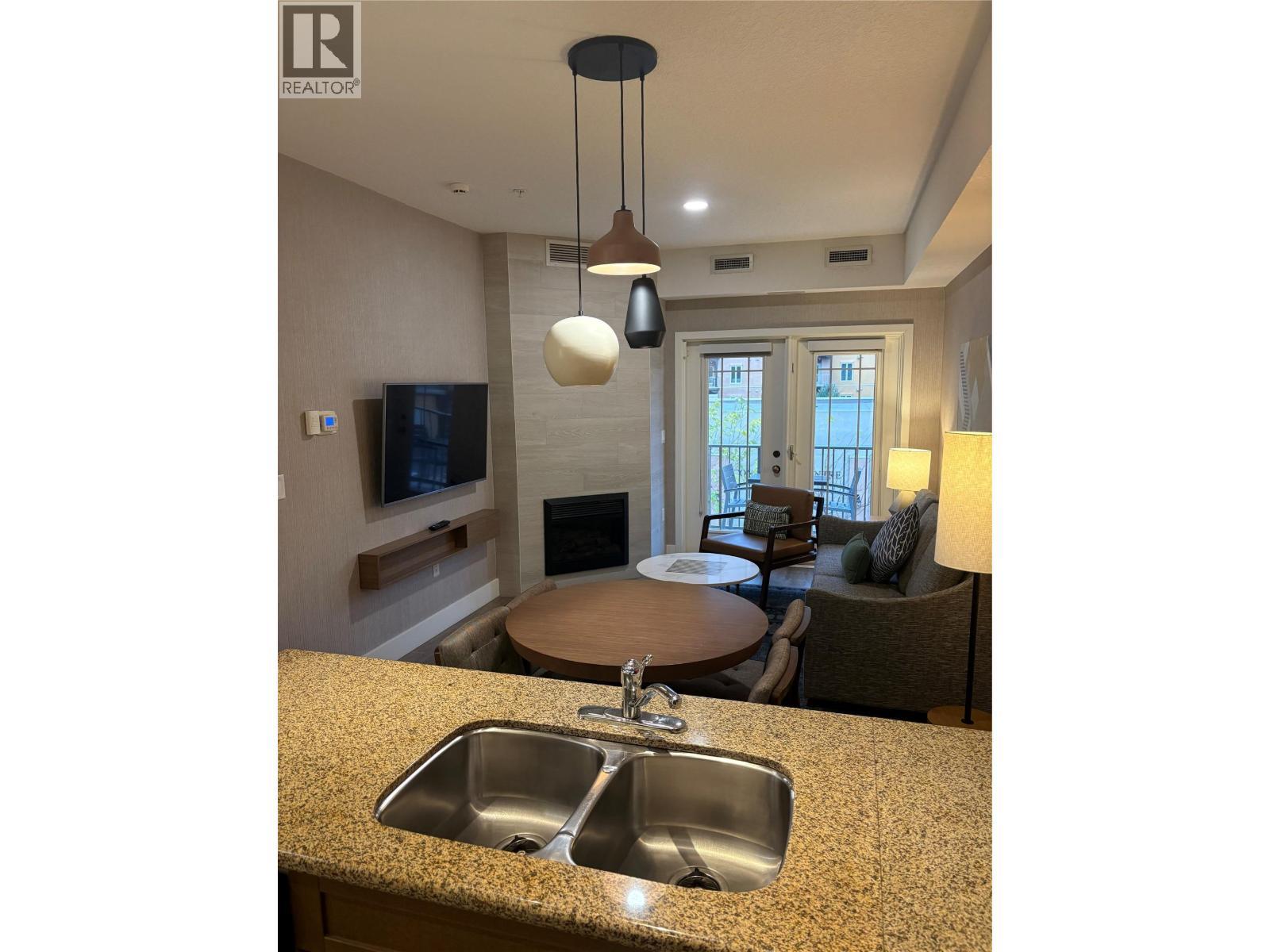 1200 Rancher Creek Road Unit# 216D, Osoyoos, BC - Indoor With Fireplace