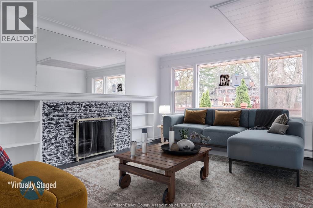3310 Rankin, Windsor, ON - Indoor Photo Showing Living Room With Fireplace