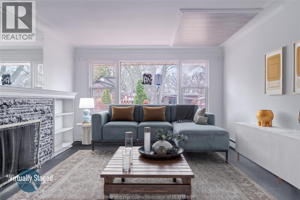 3310 Rankin, Windsor, ON - Indoor Photo Showing Living Room With Fireplace