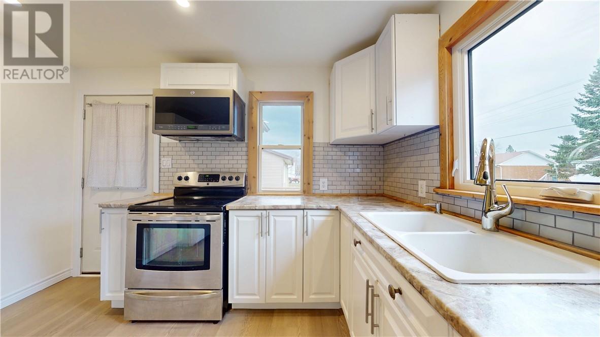 26 Vankoughnet Street, Little Current, ON - Indoor Photo Showing Kitchen With Double Sink