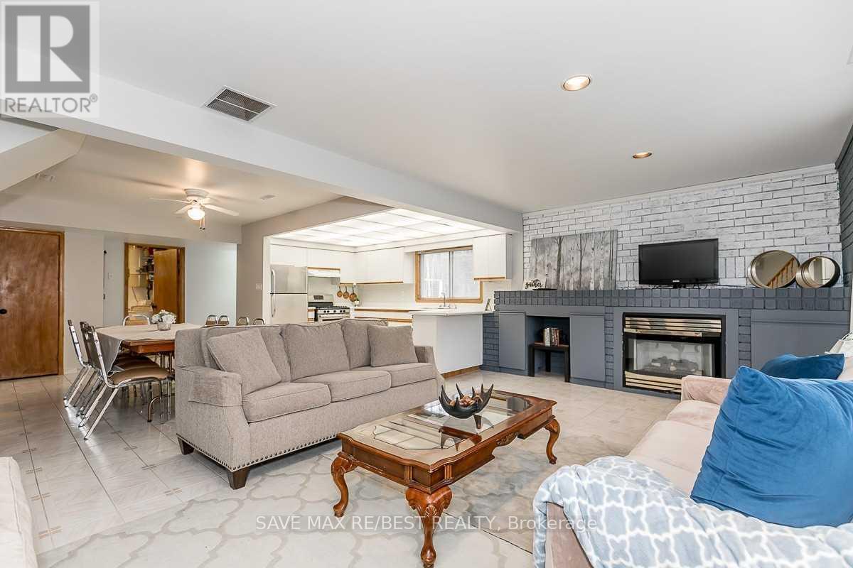 #B - 910 Concession Rd 17 W, Tiny, ON - Indoor Photo Showing Living Room With Fireplace