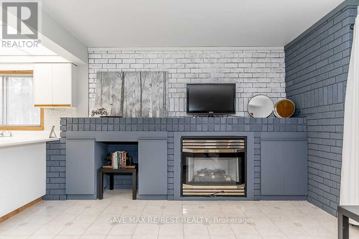 #B - 910 Concession Rd 17 W, Tiny, ON - Indoor With Fireplace
