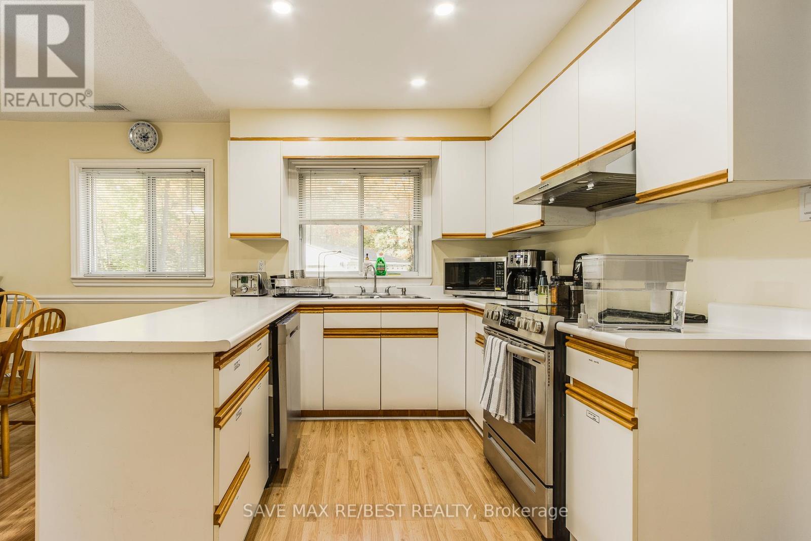 #B - 910 Concession Rd 17 W, Tiny, ON - Indoor Photo Showing Kitchen With Double Sink