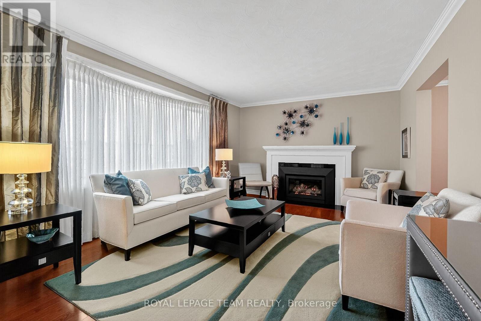 1768 Featherston Drive, Ottawa, ON - Indoor Photo Showing Living Room With Fireplace
