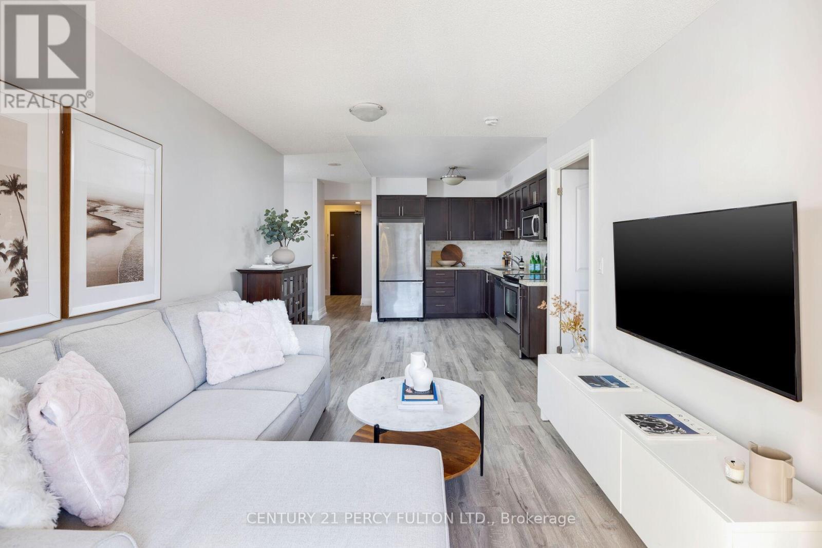 801 - 1 De Boers Drive, Toronto, ON - Indoor Photo Showing Living Room