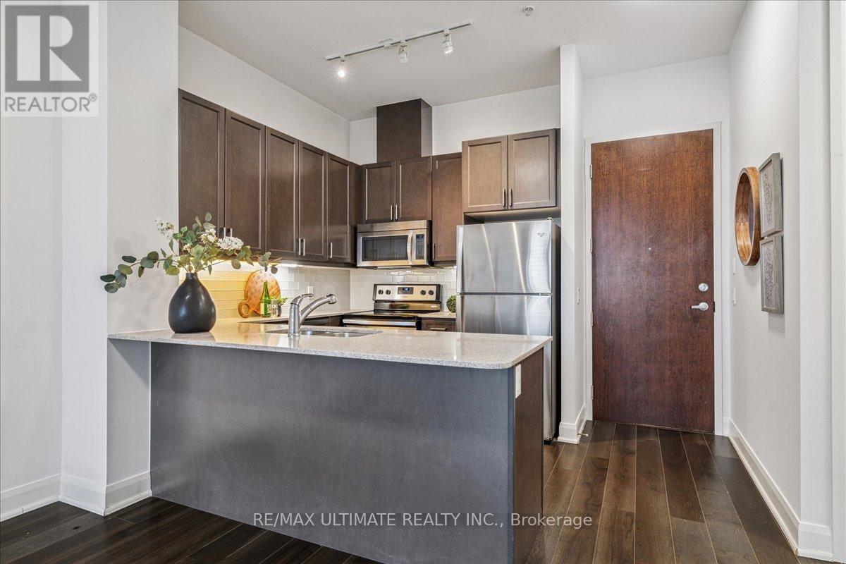 Floor to Ceiling Windows - 110 - 2480 Prince Michael Drive, Oakville, ON - Indoor Photo Showing Other Room