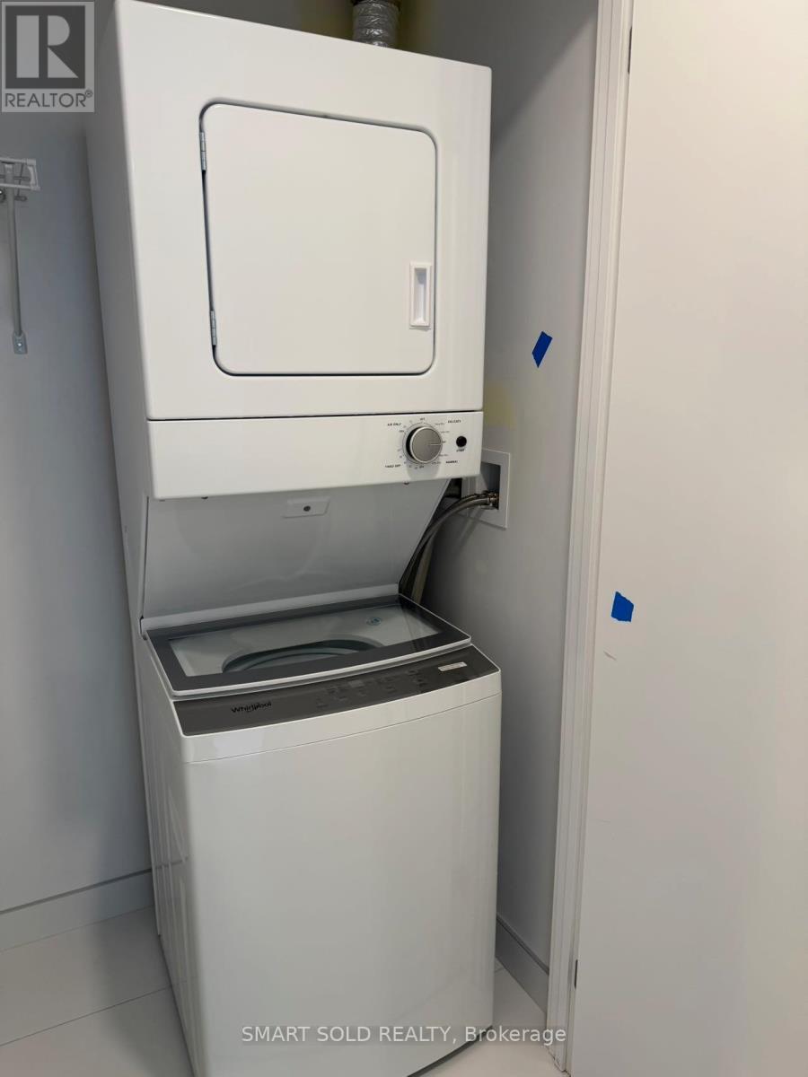 2804 - 238 Simcoe Street, Toronto, ON - Indoor Photo Showing Laundry Room