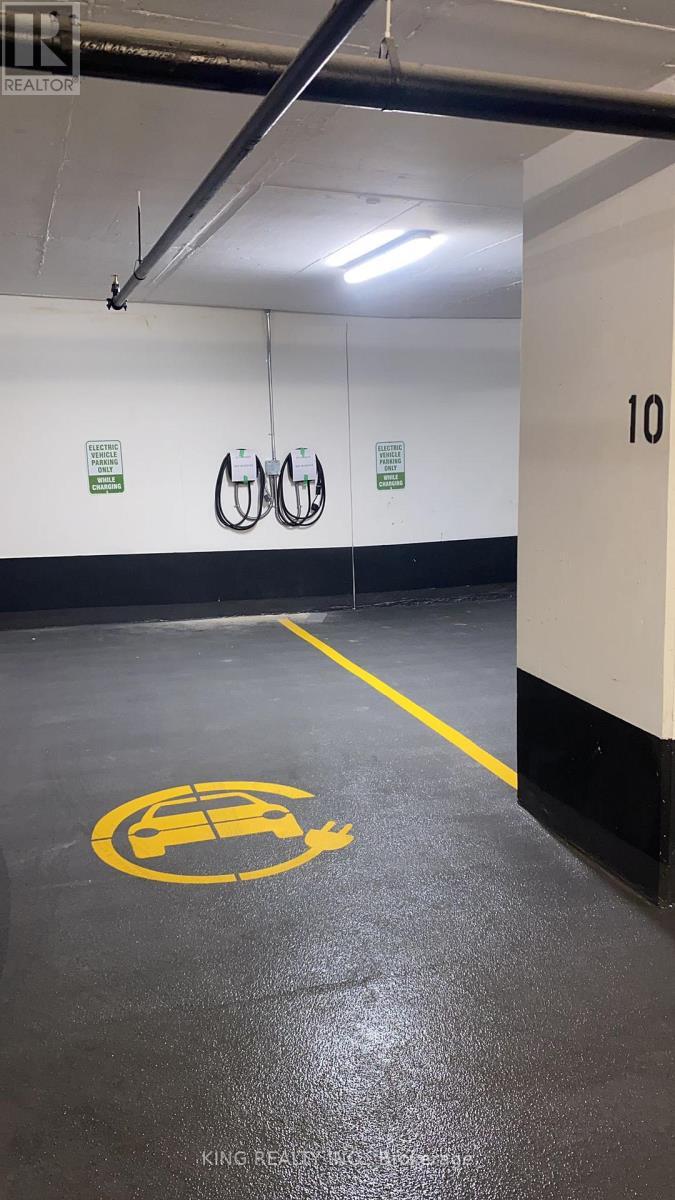 M01 - 1195 The Queensway Street, Toronto, ON - Indoor Photo Showing Garage