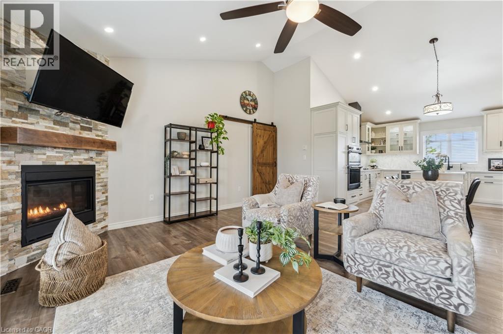 7303 Fifth Line, Wellington North, ON - Indoor Photo Showing Living Room With Fireplace