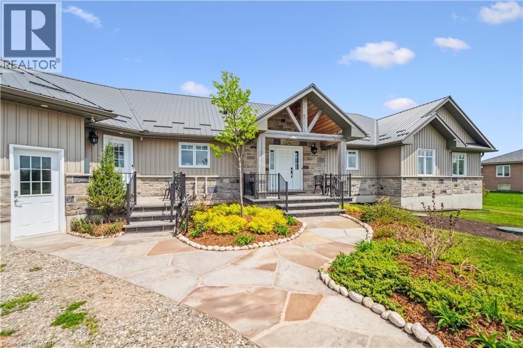 7303 Fifth Line, Wellington North, ON - Outdoor With Deck Patio Veranda With Facade