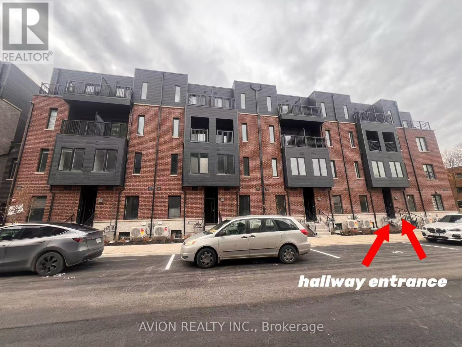 38 - 30 Calamint Lane, Toronto, ON - Outdoor With Facade