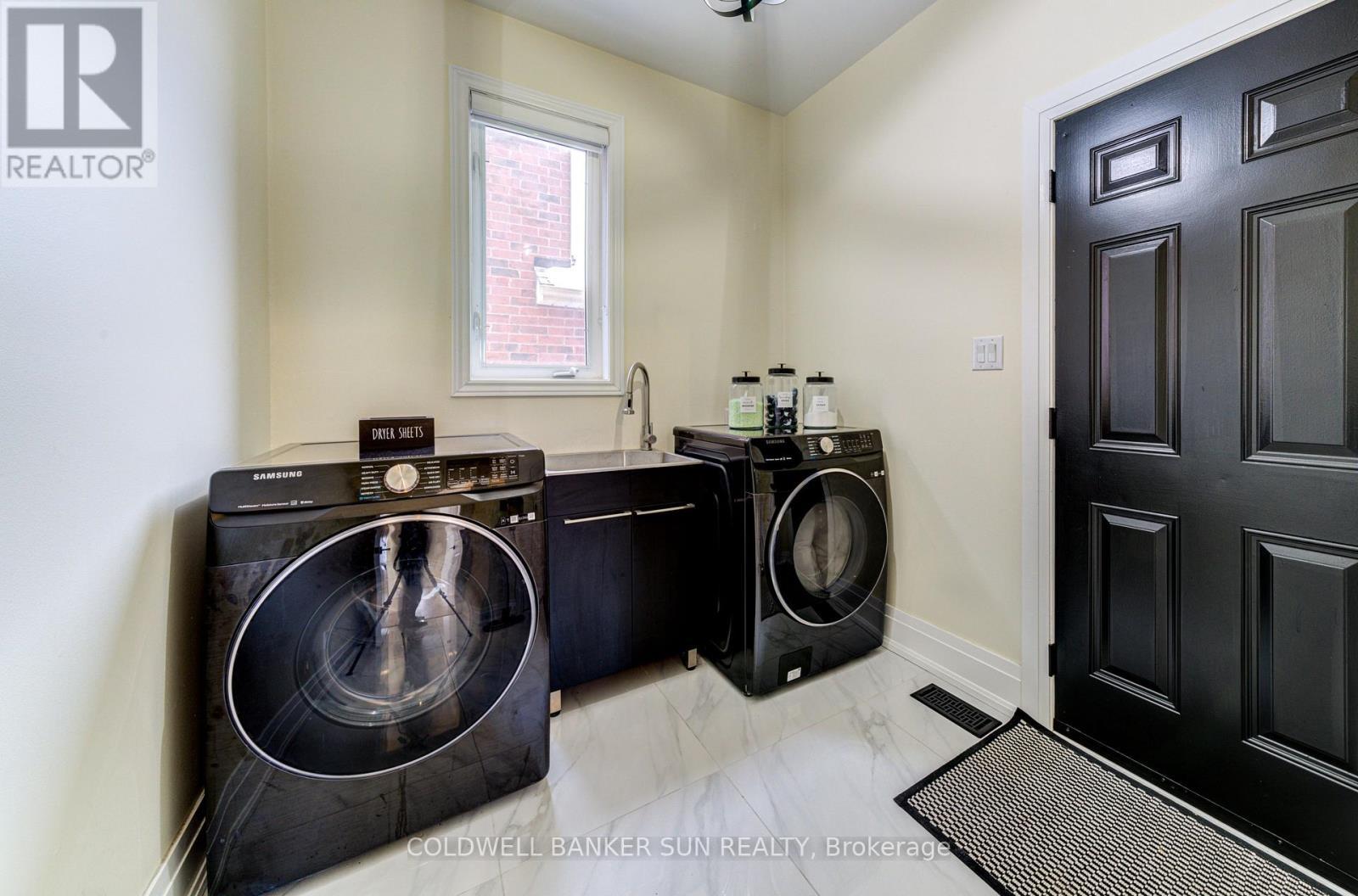 33 Ellis Crescent, Kawartha Lakes, ON - Indoor Photo Showing Laundry Room