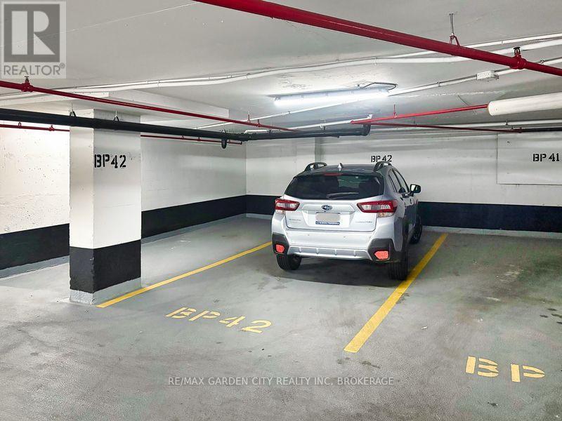 Parking Spot BP42 - 1110 - 7 Gale Crescent, St. Catharines (E. Chester), ON - Indoor Photo Showing Garage