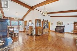 Vaulted Ceiling & Hardwood Flooring in Living Room -