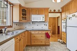 The Kitchen Features Corian Countertops -