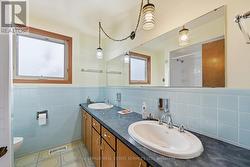 Five-Piece Bathroom with Double Sinks -