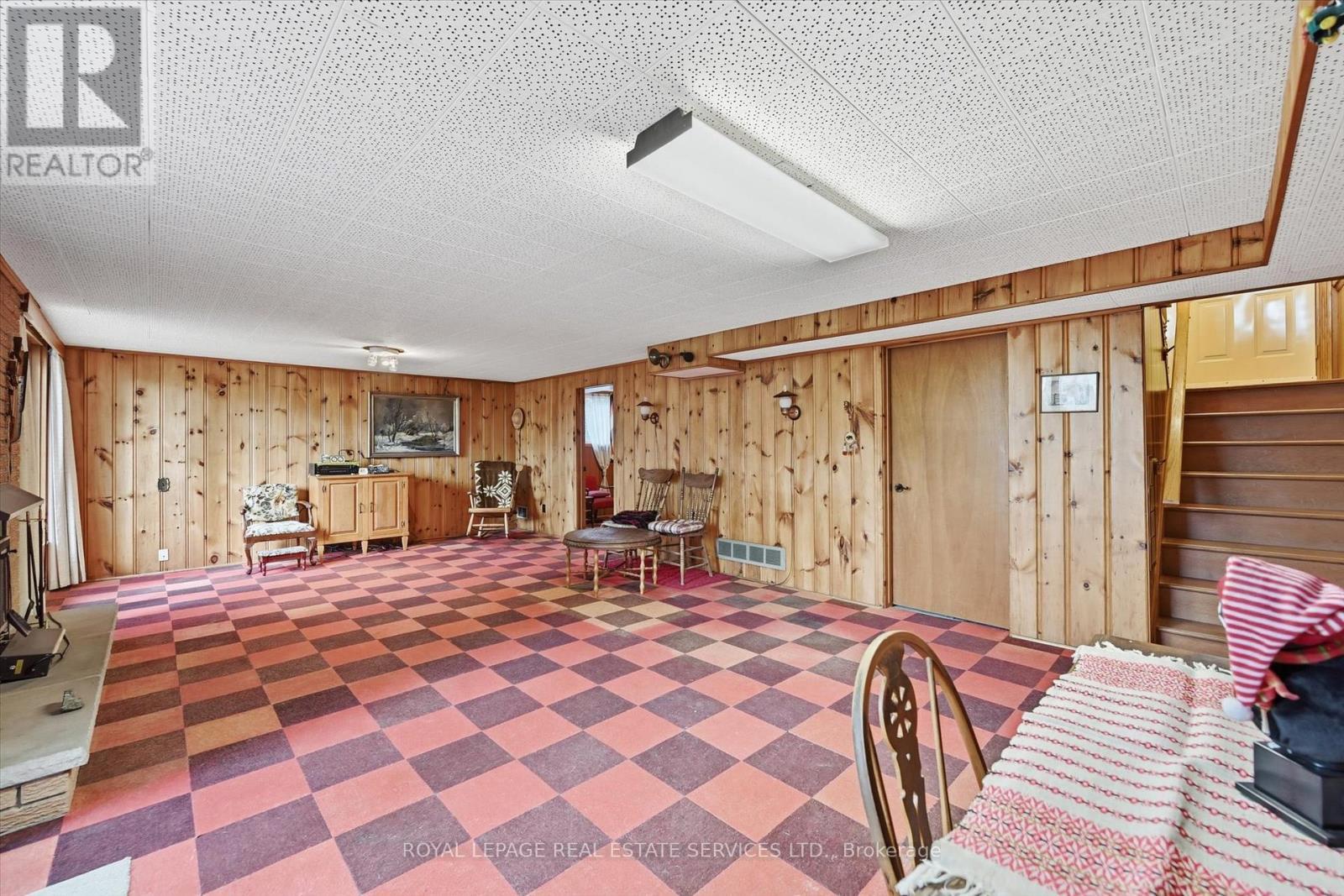 Expansive Recreation Room with Wood Paneling - 5089 Meadowhill Road, Burlington, ON - Indoor Photo Showing Other Room