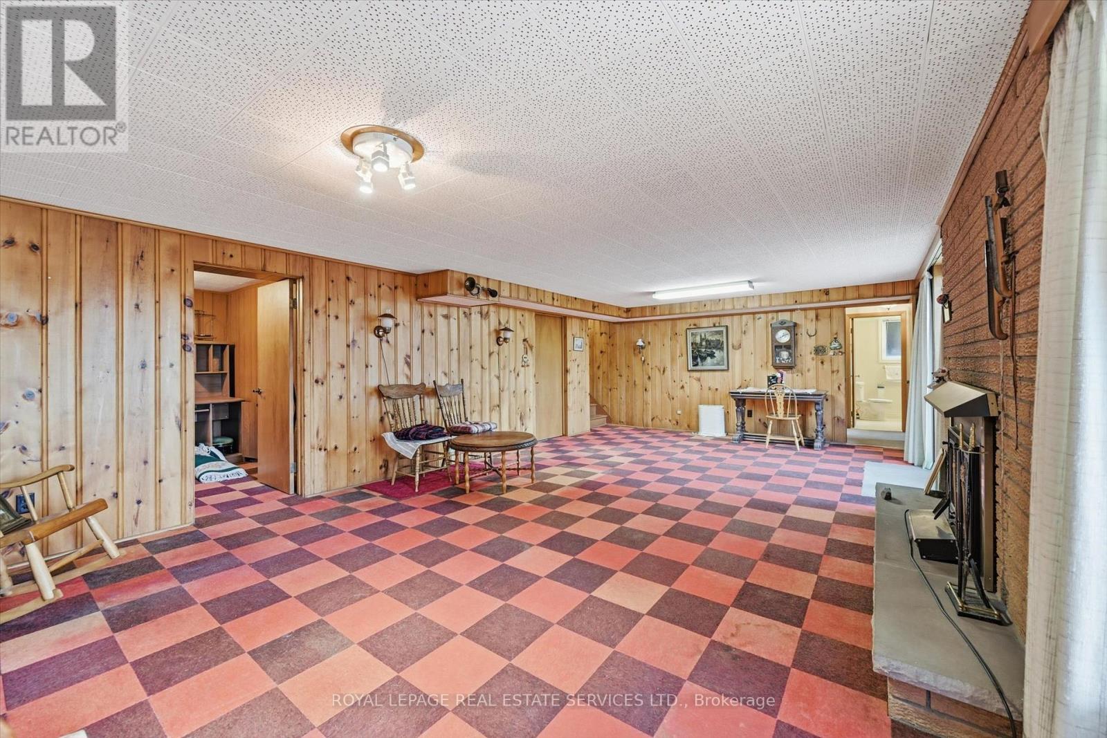 Expansive Recreation Room with Wood Paneling - 5089 Meadowhill Road, Burlington, ON - Indoor Photo Showing Other Room