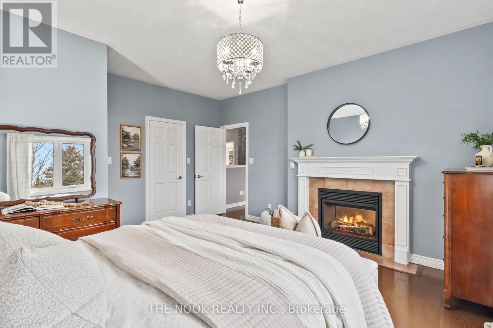 79 South Garden Court, Scugog (Port Perry), ON - Indoor Photo Showing Bedroom With Fireplace