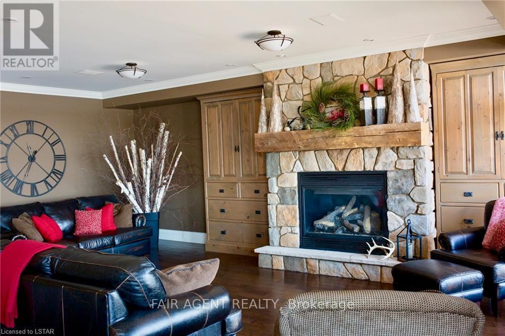 10 Mill Road, Parry Sound Remote Area (Port Loring), ON - Indoor Photo Showing Living Room With Fireplace
