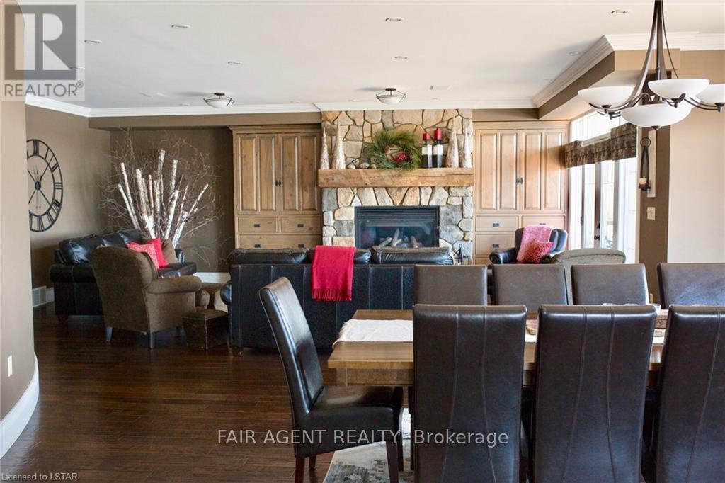 10 Mill Road, Parry Sound Remote Area (Port Loring), ON - Indoor Photo Showing Dining Room With Fireplace
