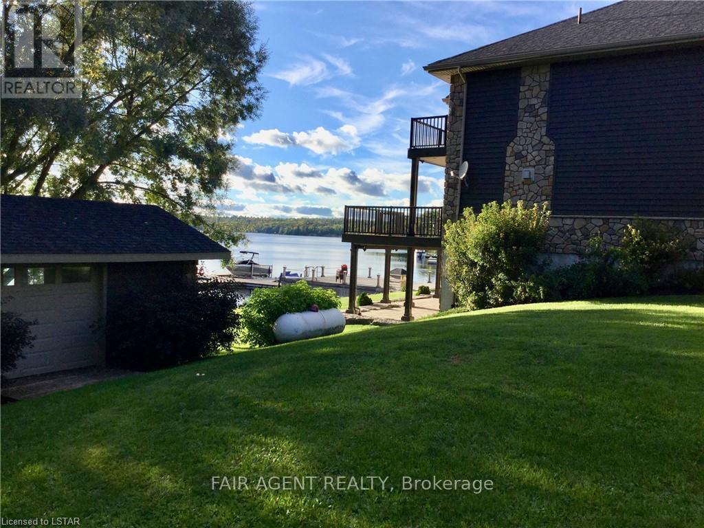 10 Mill Road, Parry Sound Remote Area (Port Loring), ON - Outdoor With Body Of Water