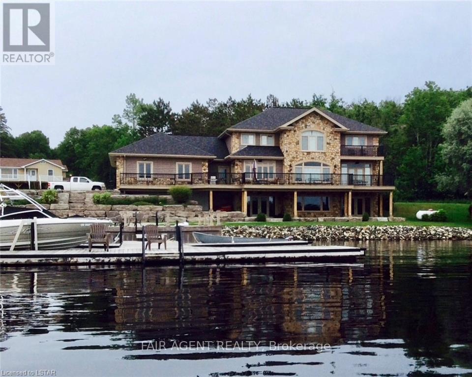 10 Mill Road, Parry Sound Remote Area (Port Loring), ON - Outdoor With Body Of Water