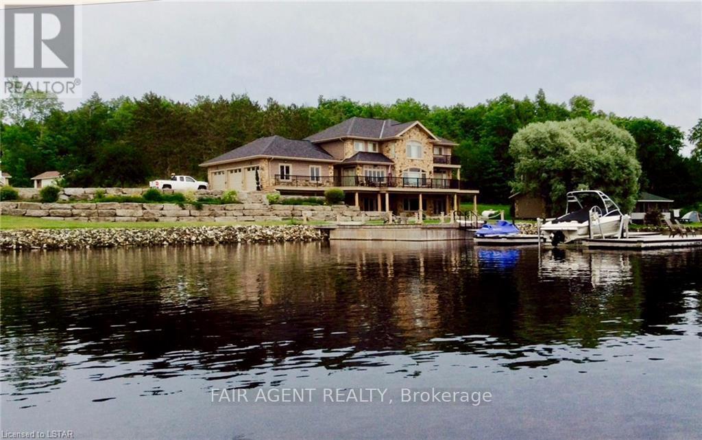 10 Mill Road, Parry Sound Remote Area (Port Loring), ON - Outdoor With Body Of Water