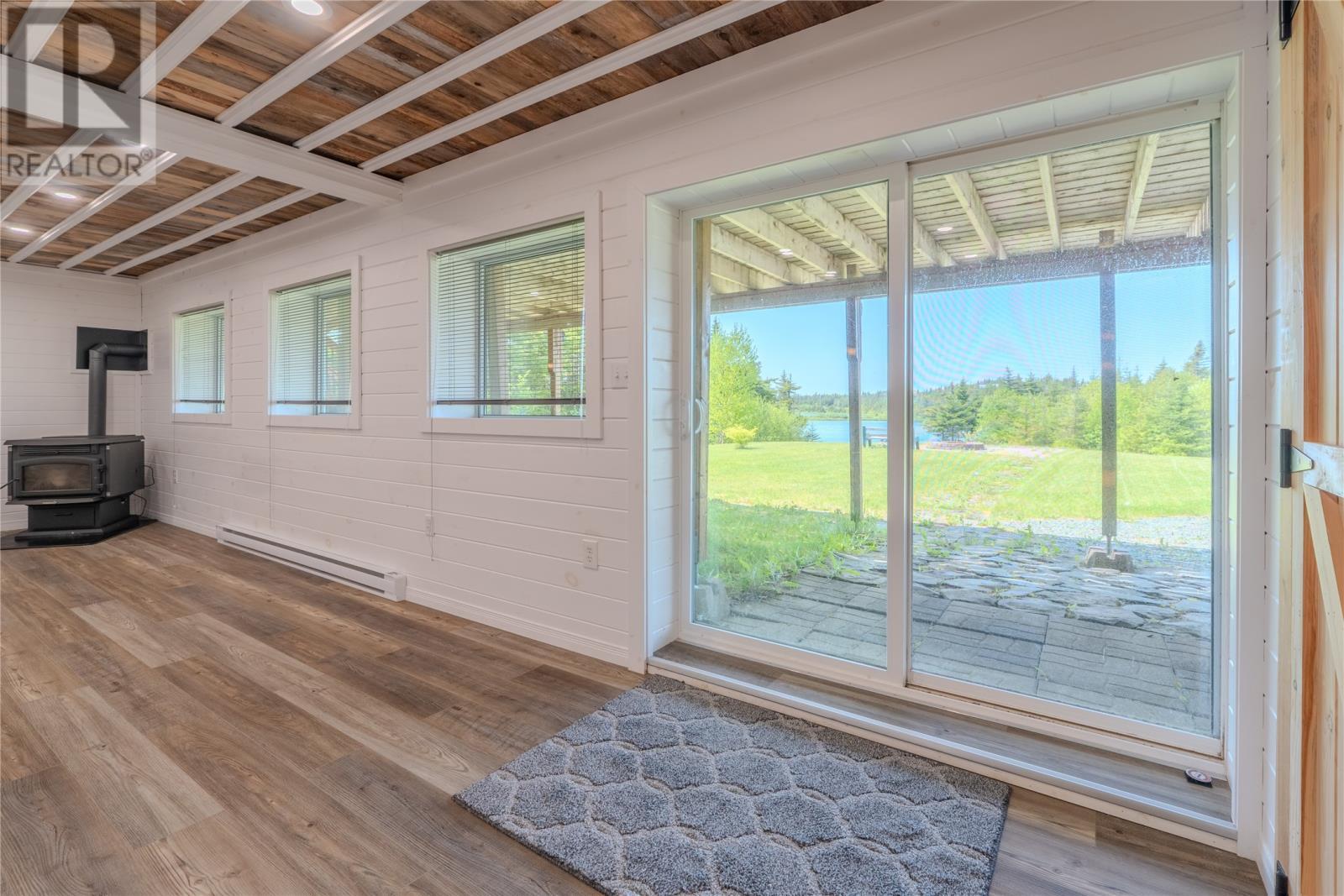 15 Amber Drive, Whitbourne, NL - Indoor Photo Showing Other Room With Fireplace