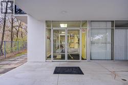 Front entrance to building with security system -