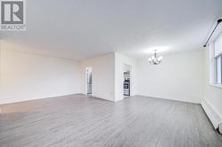 Living & dining rooms w/upgraded laminate floors -