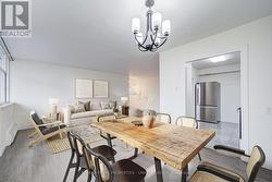 Virtually Staged Dining room towards kitchen -