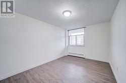 Bedroom 2 with upgraded laminate floors -