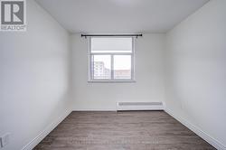 Bedroom 3 with upgraded laminate floors -