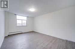 Massive primary bedroom w/upgraded laminate floor -