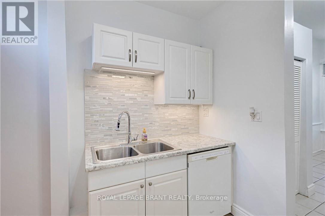 95 Queen Street, Brantford, ON - Indoor Photo Showing Kitchen With Double Sink